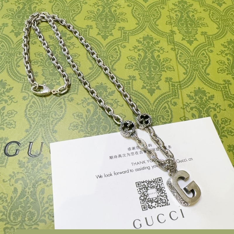G*u*i necklaces
